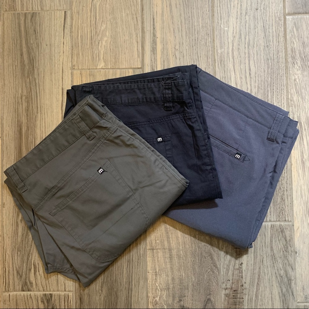 Lot of Travis Matthew golf pants